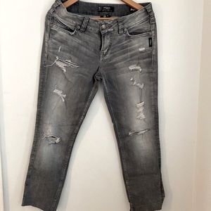 Raw hem grey distressed jeans